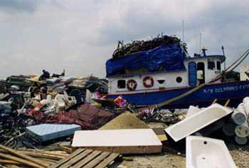 Crossroads, Haitian trading vessel on the Miami River, Barbara Jo Revelle, 1998.