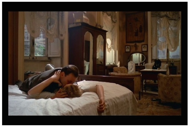 On the bed, Anna responds to Marcello’s embrace and French kiss.